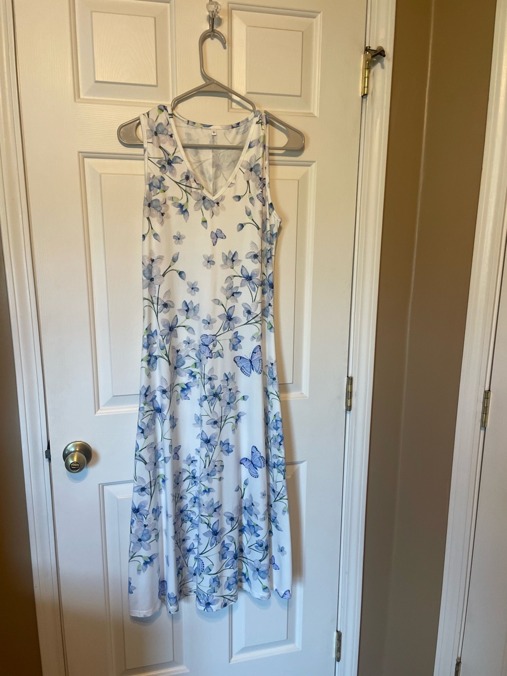 Sleeveless White Maxi Dress with Blue Floral & Butterfly Print by